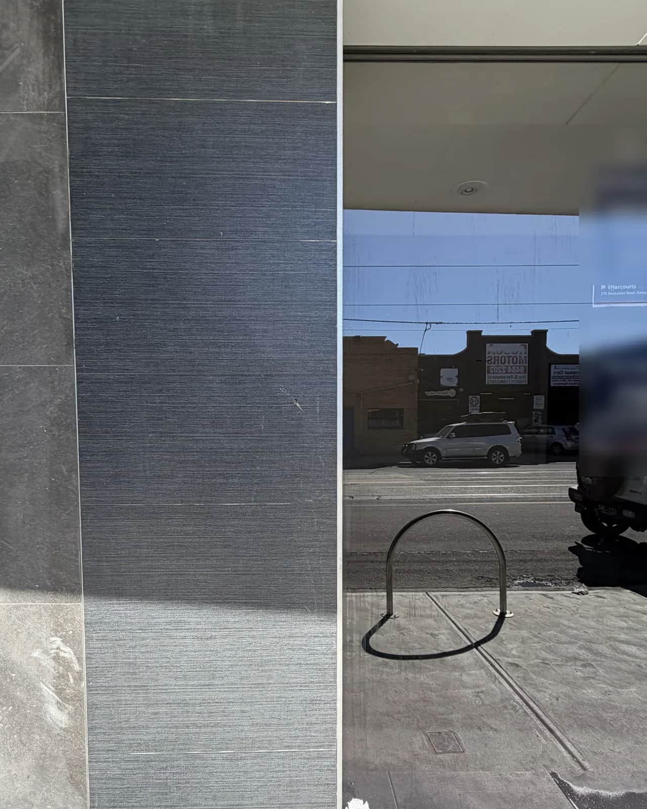 The same tiled column and window, clean